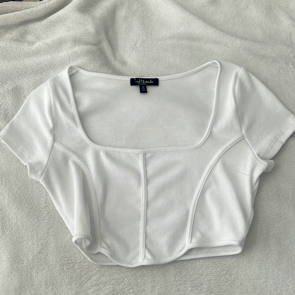 A crop top in the color white, small, I wore once